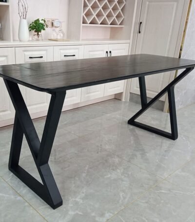 The Modern Black Wood & Metal Console Table features a bold geometric design with a sleek black wooden top, perfect for modern interiors and decorative spaces.